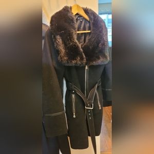 Inc black fur coat size large slightly used but in great condition.